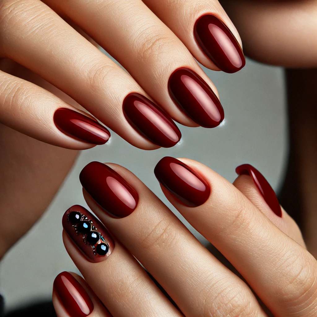 Glossy Red Nails with Black Stone Accents