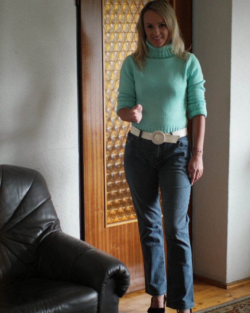 Chunky Sweater Tucked into High-Waisted Jeans